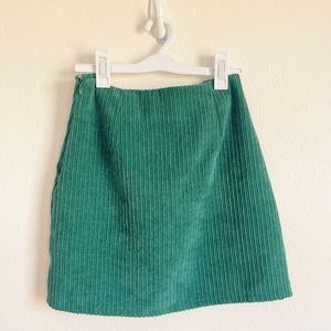 stunning evergreen colored alterd state mini skirt 🌲